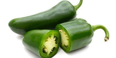 Fresh green jalapeño peppers.