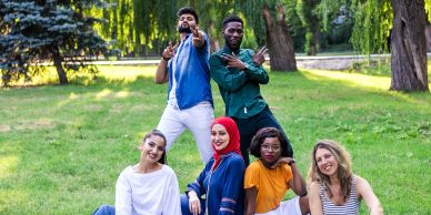 Group of friends enjoying time outdoors in a park.