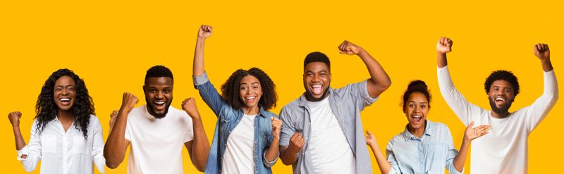 Collage of happy black people men and women celebrating success on yellow studio background, panorama