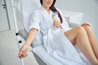 Happy young woman in anticipation for her vitamin IV infusion in Pleasant Grove, UT.