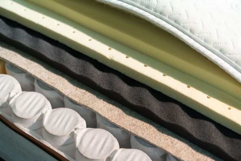 Mattress filler. Coconut coir, Nature para latex rubber, memory foam independent spring. The concept of filling a mattress. Technology Concept