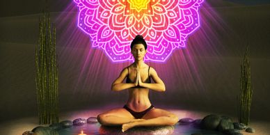 Woman meditating in desert with glowing mandala behind her.