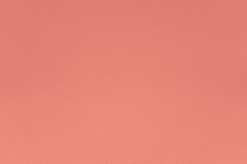 Texture of burnt coral colored paper for watercolor and pastel. Fashionable pantone color of spring-summer 2021 season from fashion week. Modern luxury background or mock up, copy space.