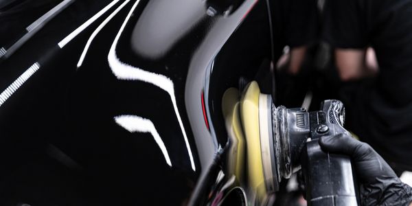 Expert auto detailing technician Downriver Michigan Gloss Boss Mobile Detailing. 