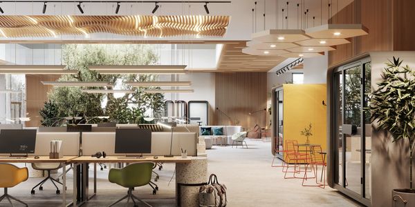 Modern office space with natural lighting and greenery.