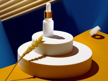 Minimalist skincare dropper bottle on white geometric platforms with warm lighting.