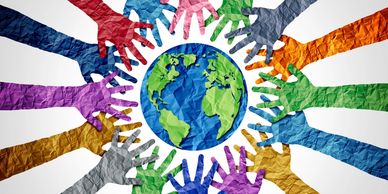 Hands wrapped around the earth in unity