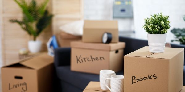 Labeled moving boxes waiting to get loaded.