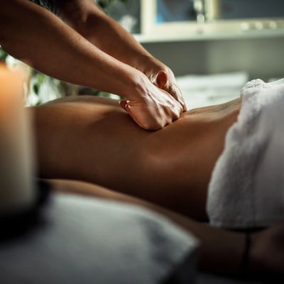 Lower back massage with closed fists