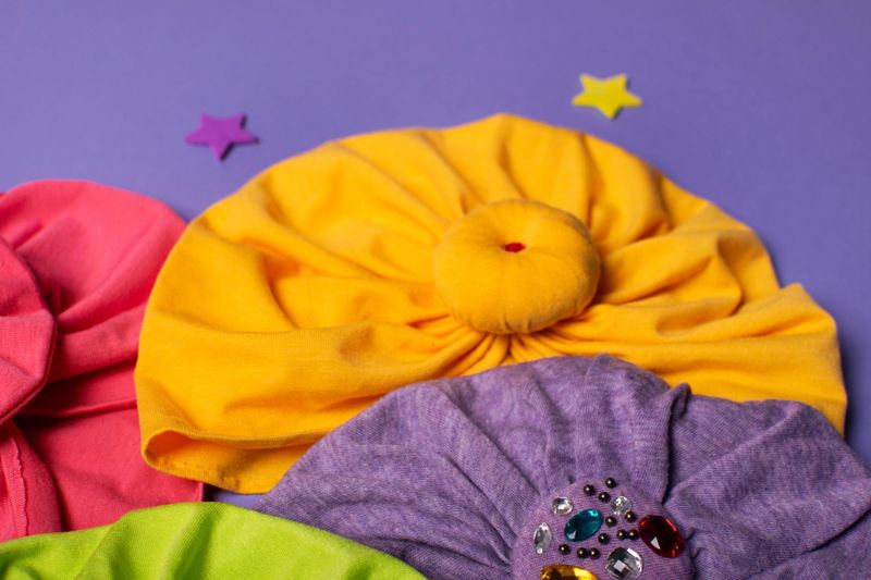 Delicate bright turbans for women, girls or baby. Turban fashion or bandana hair accessories for the beach and travel.