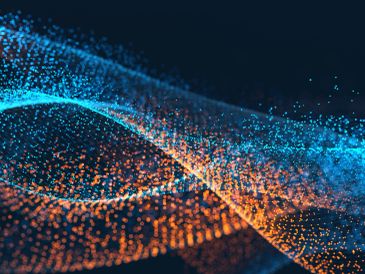 Abstract digital waves of blue and orange glowing particles flowing in space.