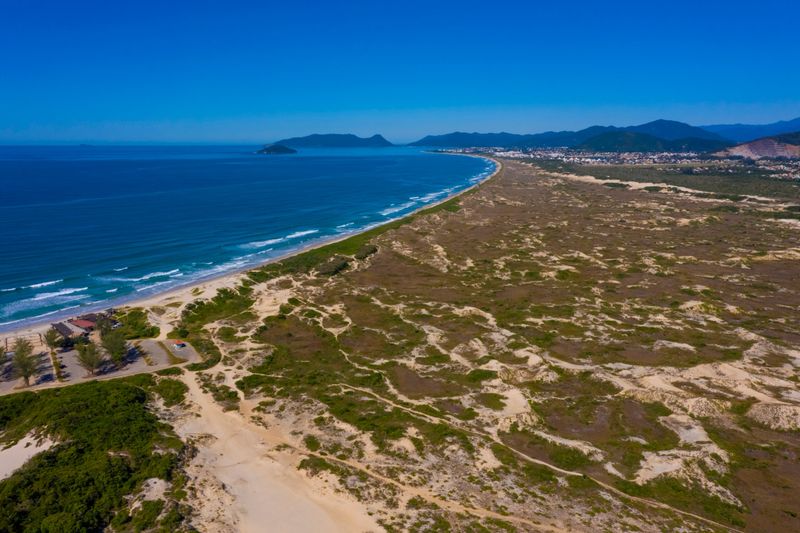 Aerial footage over Joaquina beach in Florianopolis, Santa Catarina, Brazil.