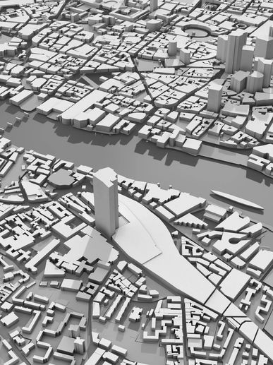 3D model of a city with a prominent river and buildings in grayscale.