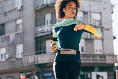 Person tracking progress while following a tailored weight loss program.