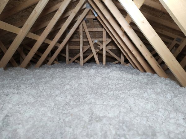 fluffy new R-38 level blown in insulation in the attic