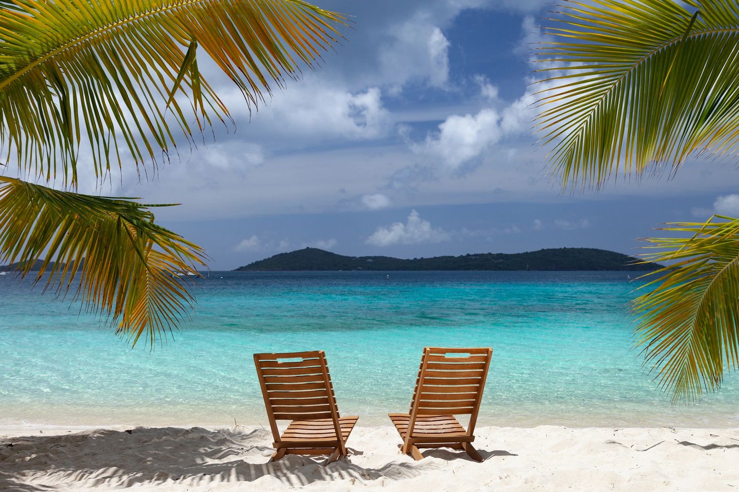 Two chairs on a beach