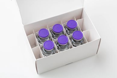 Box of five medicine vials with purple caps.