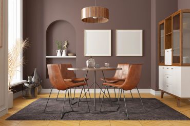 Modern dining room with brown chairs and table.