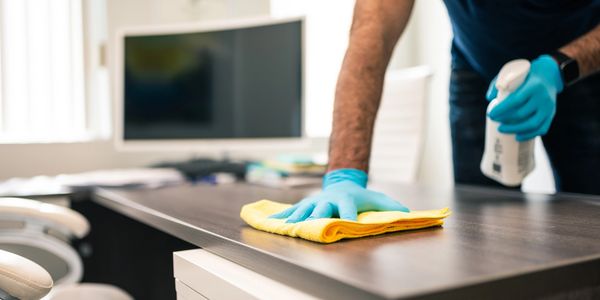 Cleaning an office table, High Quality Cleaning