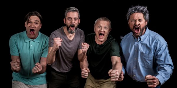 Four men expressing excitement or cheering.