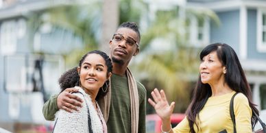 Three people viewing a home