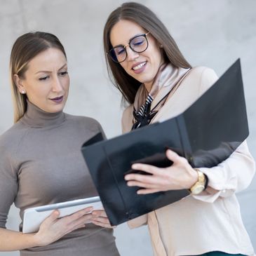 Female coach and female client going through menopause plan