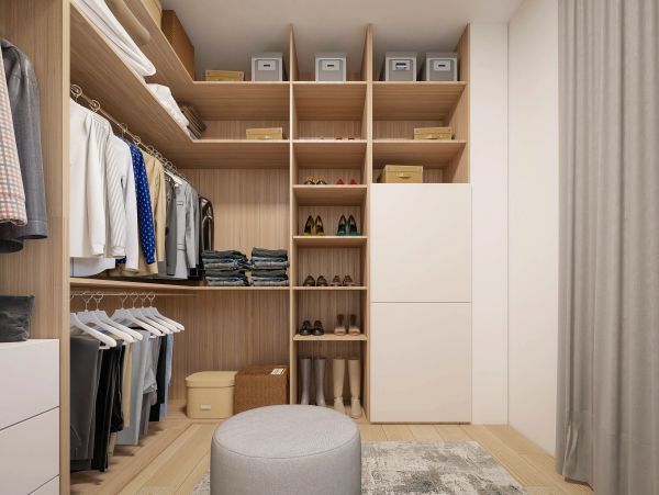 Modern walk-in closet with organized shelves and clothing racks.
