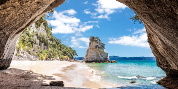 View under the rock cave at Cathedral Cove in New Zealand