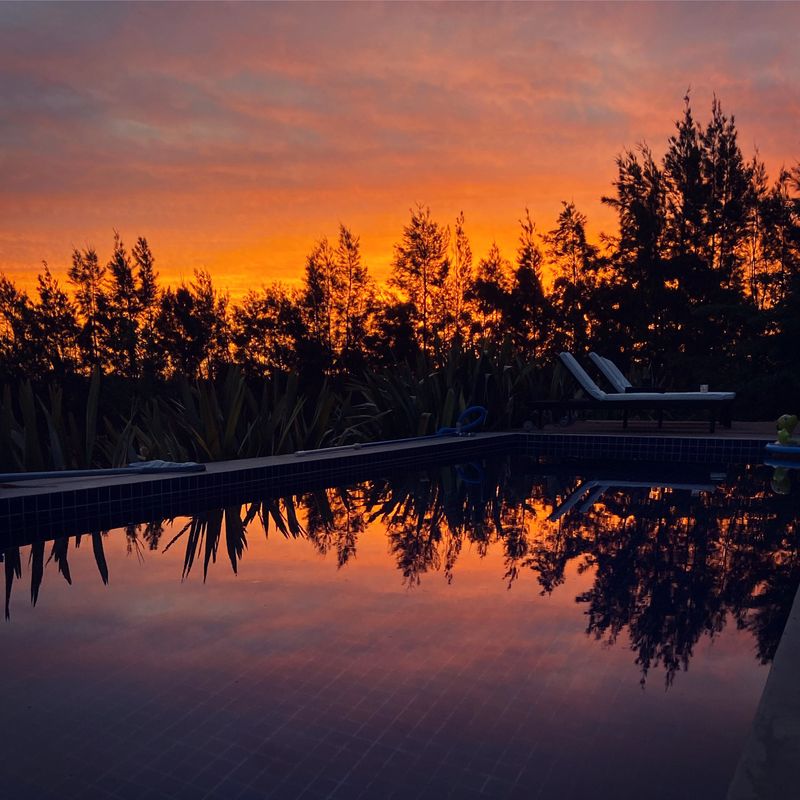 Beautiful sunset by the pool