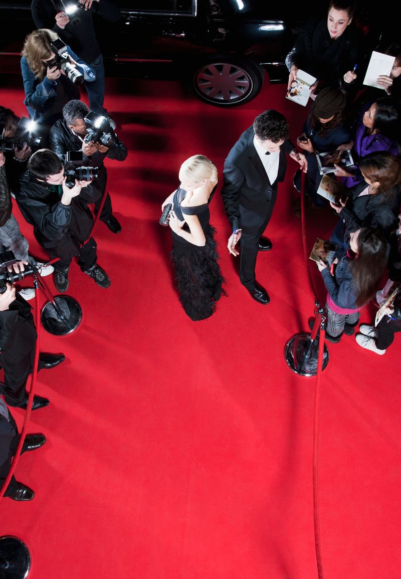 Celebrities working on red carpet