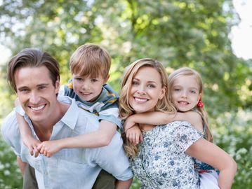 smiling family of 4 feeling well with direct primary care and functional medicine in Owasso
