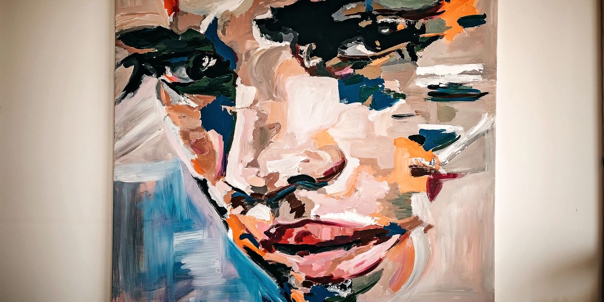 Abstract close-up portrait painting with bold, colorful brushstrokes.