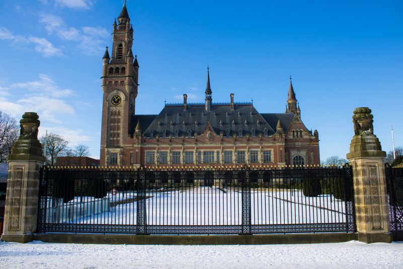 The Peace Palace in The Hague, Netherlands, surrounded by snow, is an administrative building for international law, and houses the International Court of Justice, winter in The Hague.