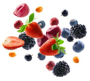 Juicy blackberries with leaves.