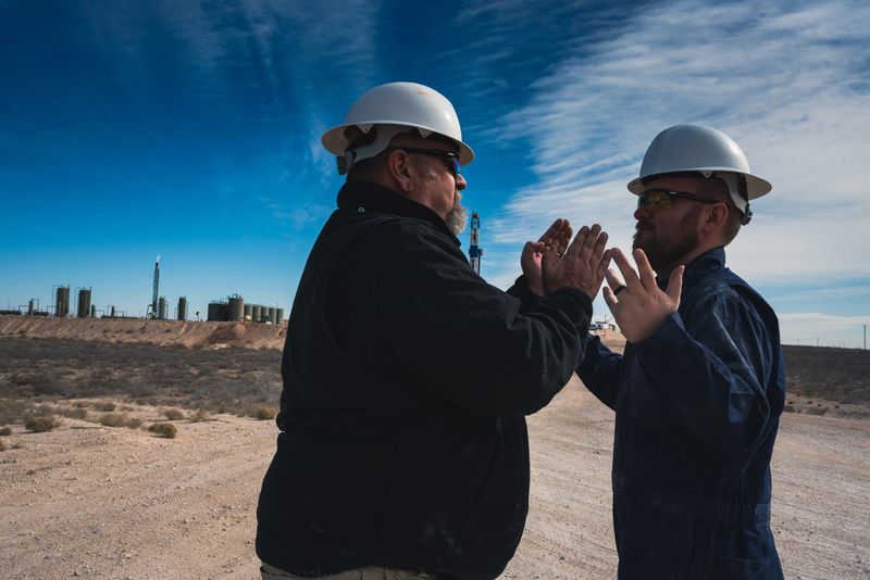 An oil rig in the New Mexican planes at sunrise