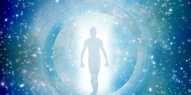 Silhouette of a person walking through a glowing portal in a starry cosmic background.