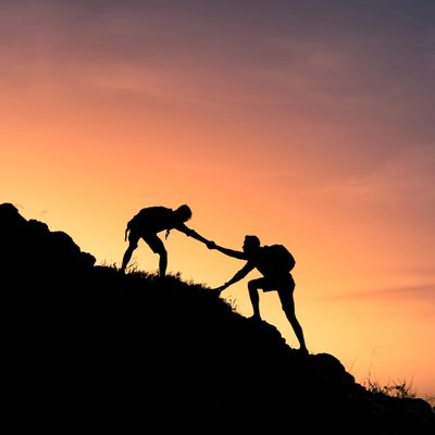 1 climber helping another with anxiety fear anger sadness identity mental health