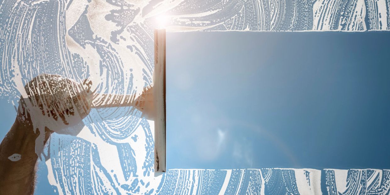 Window cleaning with the reach and wash pure water system. 

