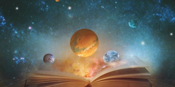 Planets emerging from an open book in a cosmic scene.