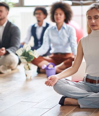 Person giving a presentation on balance and well-being.