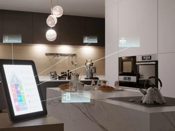 Modern kitchen with smart home control and connected appliances.