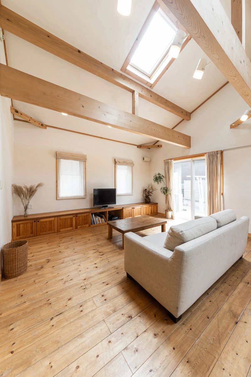 Living room in a house where the sun shines through the skylight