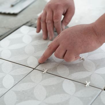 Elegant modern tile layout with grey and white floral-patterned tiles