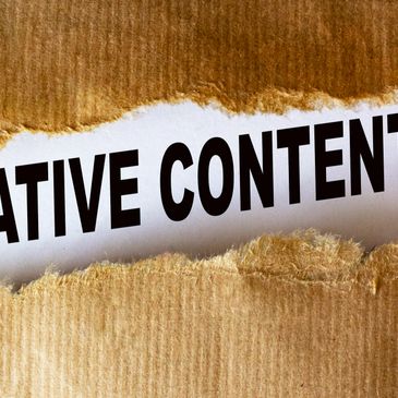 Text 'CREATIVE CONTENT' revealed beneath torn brown paper.