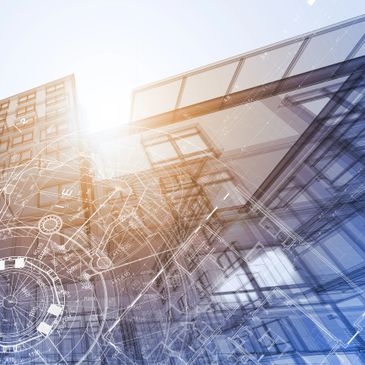 Architectural blueprint overlay on modern building glass facade with sunlight.