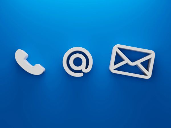 White contact icons on a blue background representing phone, email, and mail.