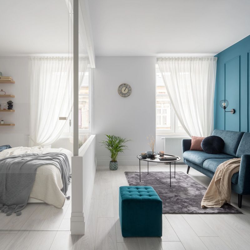 Charming, small and bright studio apartment with nice living room and stylish bedroom separated with glass wall
