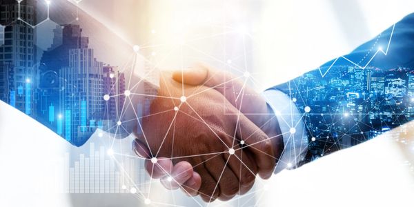 Handshake symbolizing trusted partnerships and collaboration in electronics manufacturing.