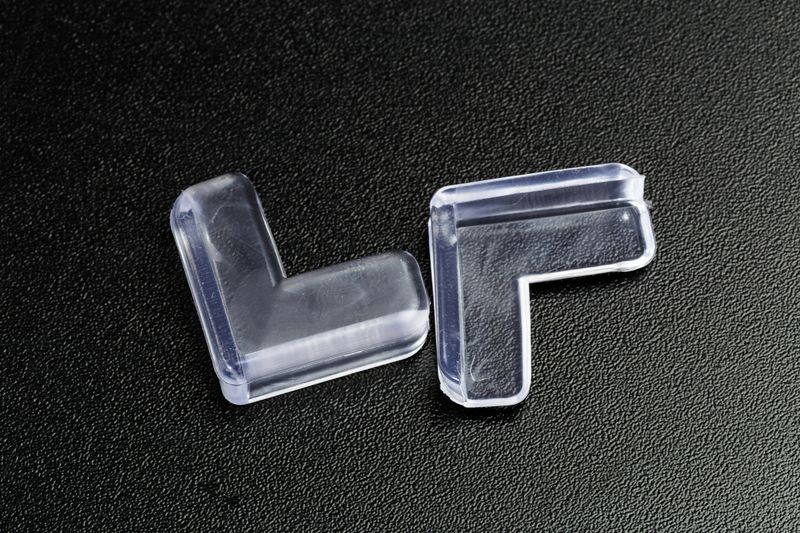 Protection for sharp corners, child safety, Baby Safety Edge Corner on black   background