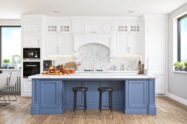 Bright kitchen with blue island and white cabinetry.